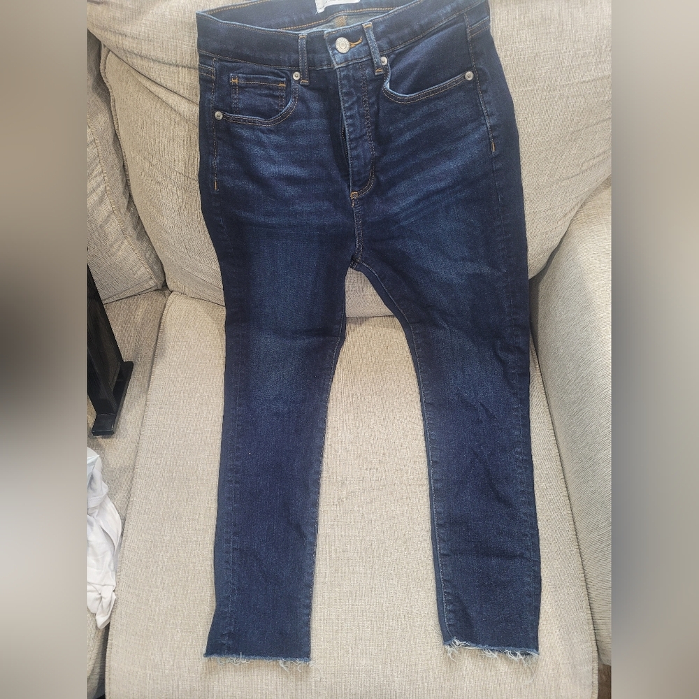 Loft size 4 petite skinny jeans with frayed bottom